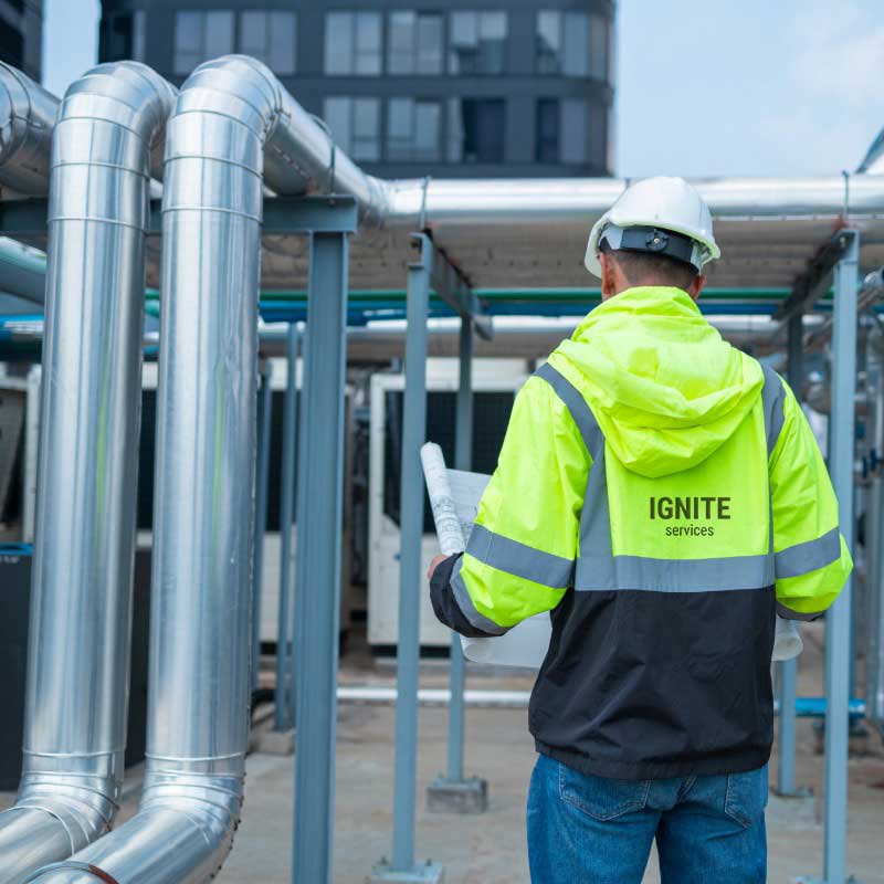 Ignite Services intro image of industrial plumbing technician